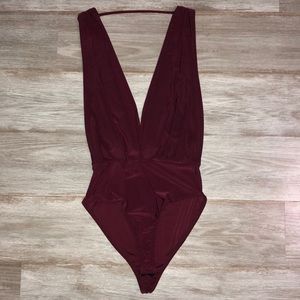 Charlotte Russe purple body suit